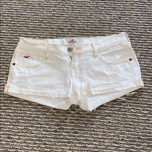 Off white, distressed Hollister shorts.